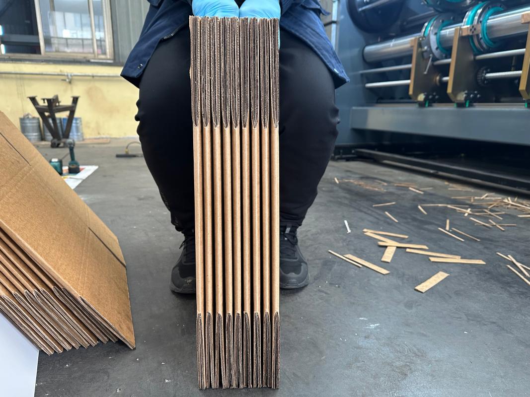 Finished products produced by large-scale cardboard packaging machinery Finished products produced by large-scale cardboard packaging machinery