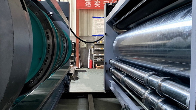 Carton Printing Machine Anilox And Rubber Rollers Closeup Carton Printing Machine Anilox And Rubber Rollers Closeup
