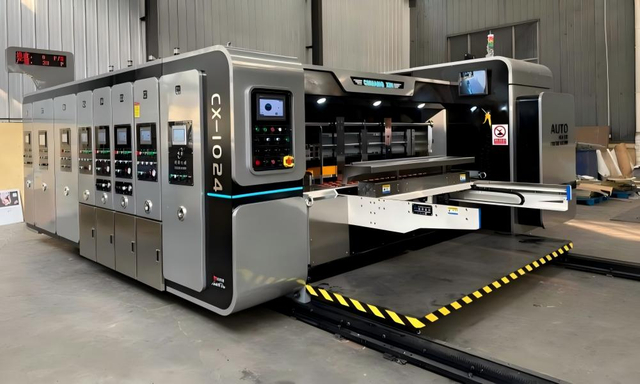 fully automatic 4-color carton printing, slotting, gluing and strapping intelligent integrated line in Romania