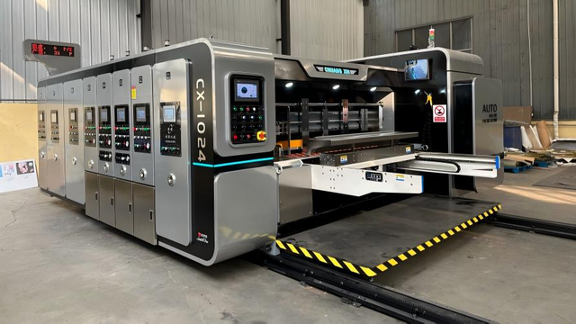 fully automatic 4-color carton printing, slotting, gluing and strapping intelligent integrated line in Romania